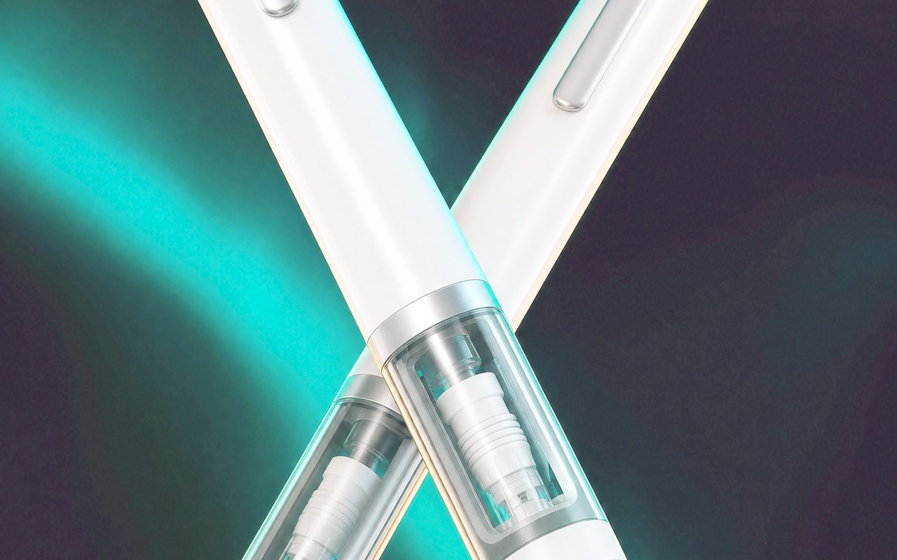 Two unbranded injector pens crossing, lit by an emerald aurora